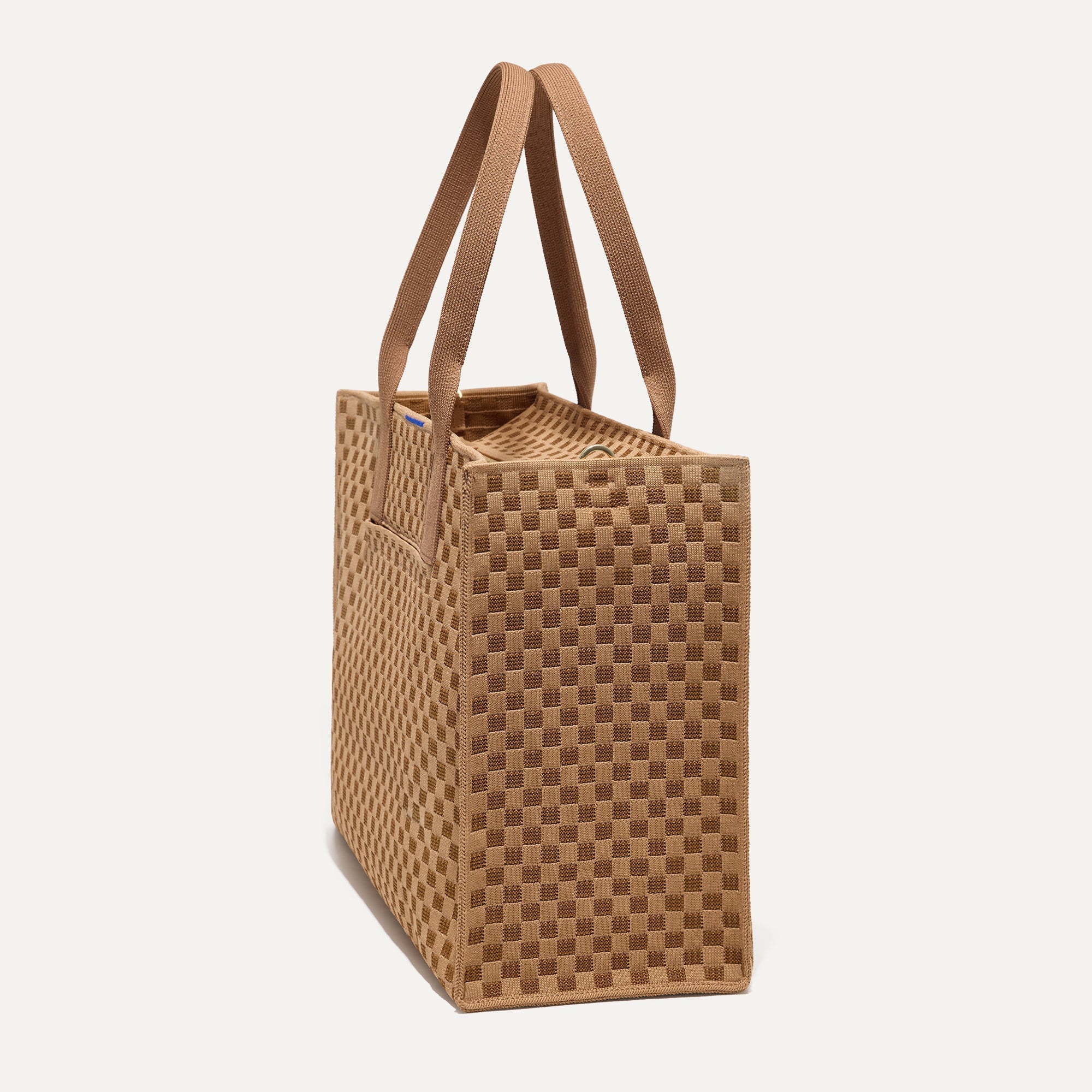 The Classic Tote in Hazelnut, shown from the side.