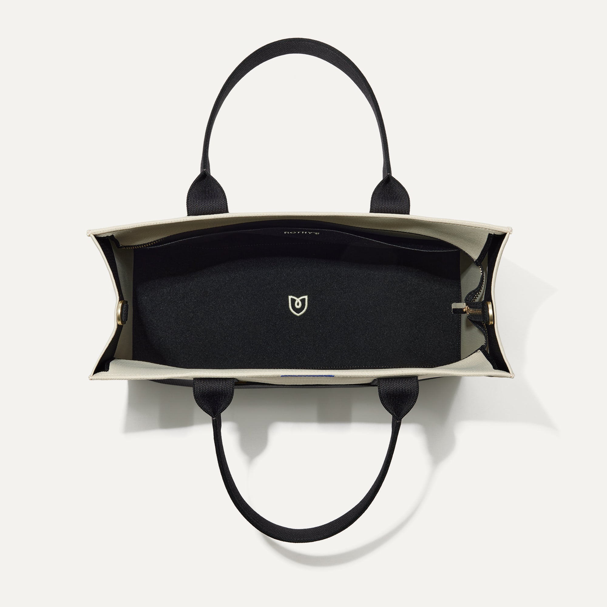 The Classic Tote in Luna, shown from above, with the interior exposed.