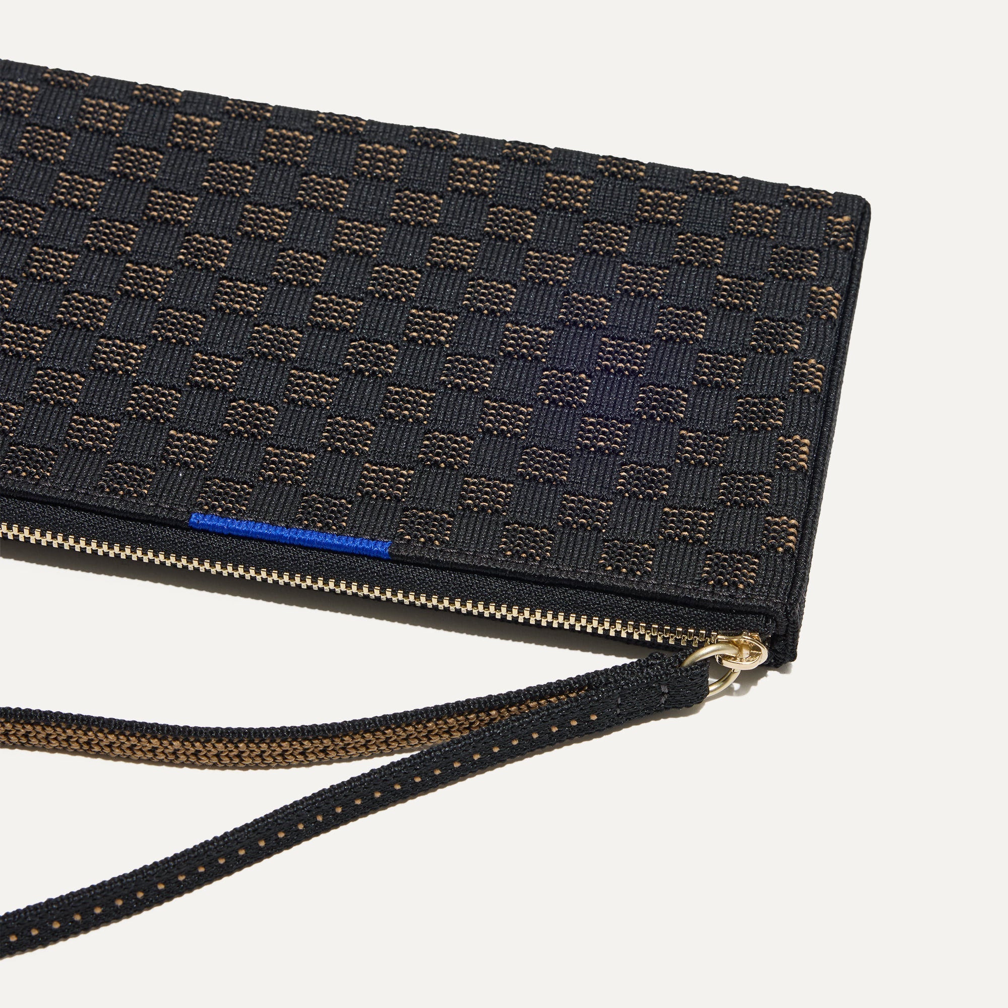 A closeup of The Wallet Wristlet in Night Song, focusing on the wrist strap.