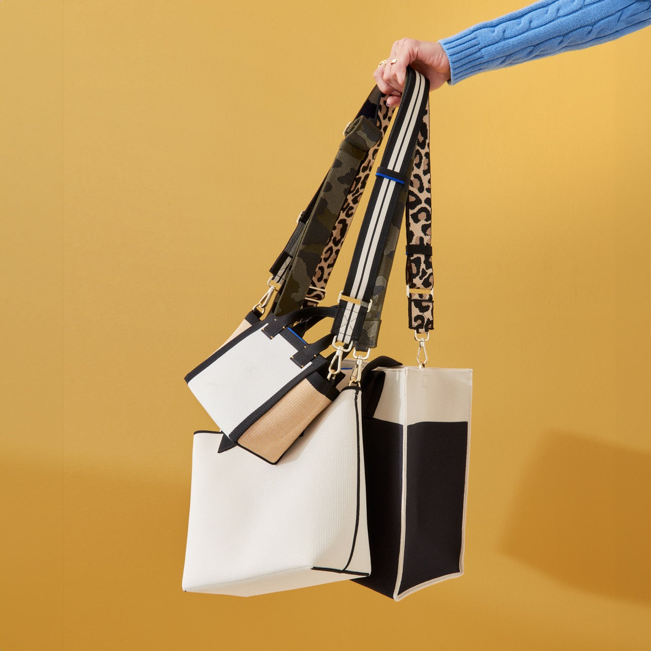 The Crossbody Strap paired with The Mini Handbag, The Lightweight Petite Tote and The Classic Tote.