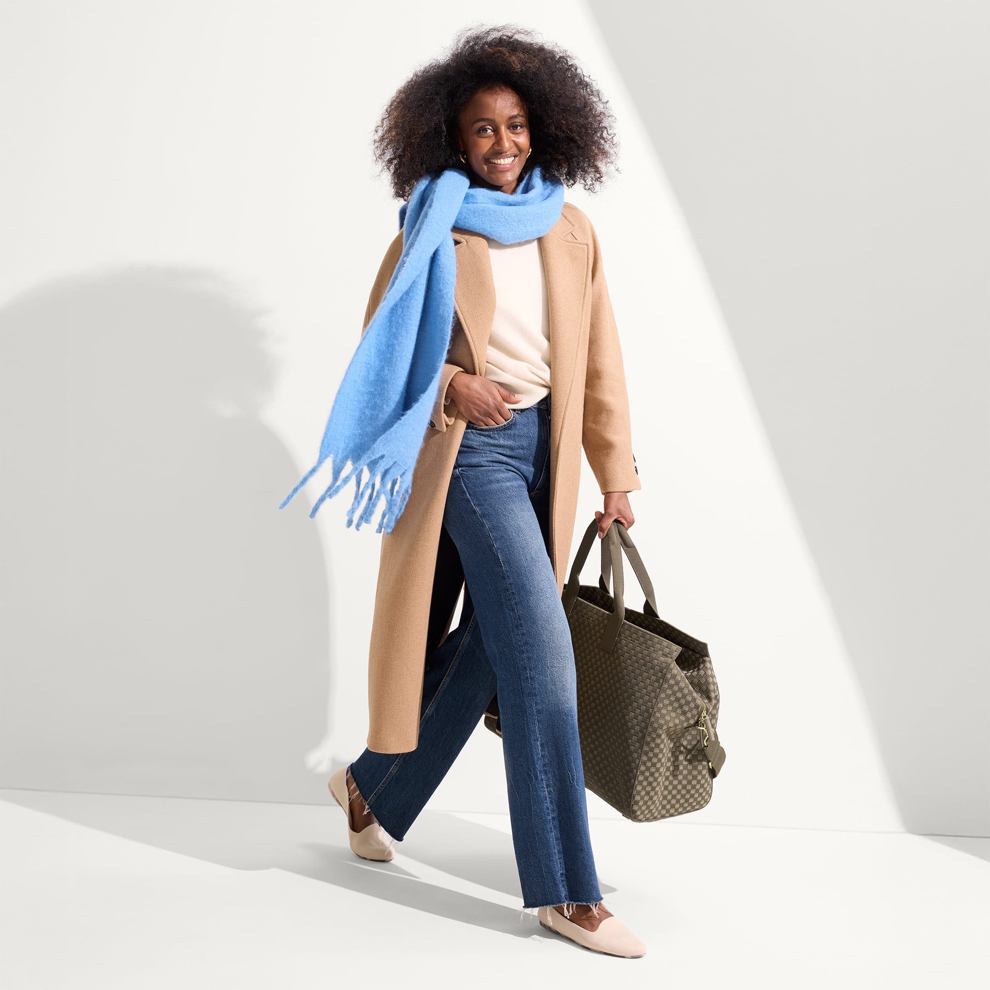 An alternate view of The Weekender in Safari Green on a model.