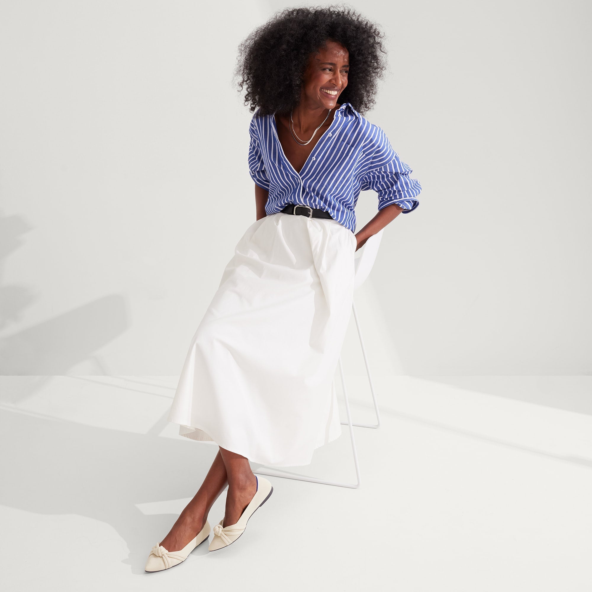 Alternate view of a model wearing The Knot Point II in Conch.