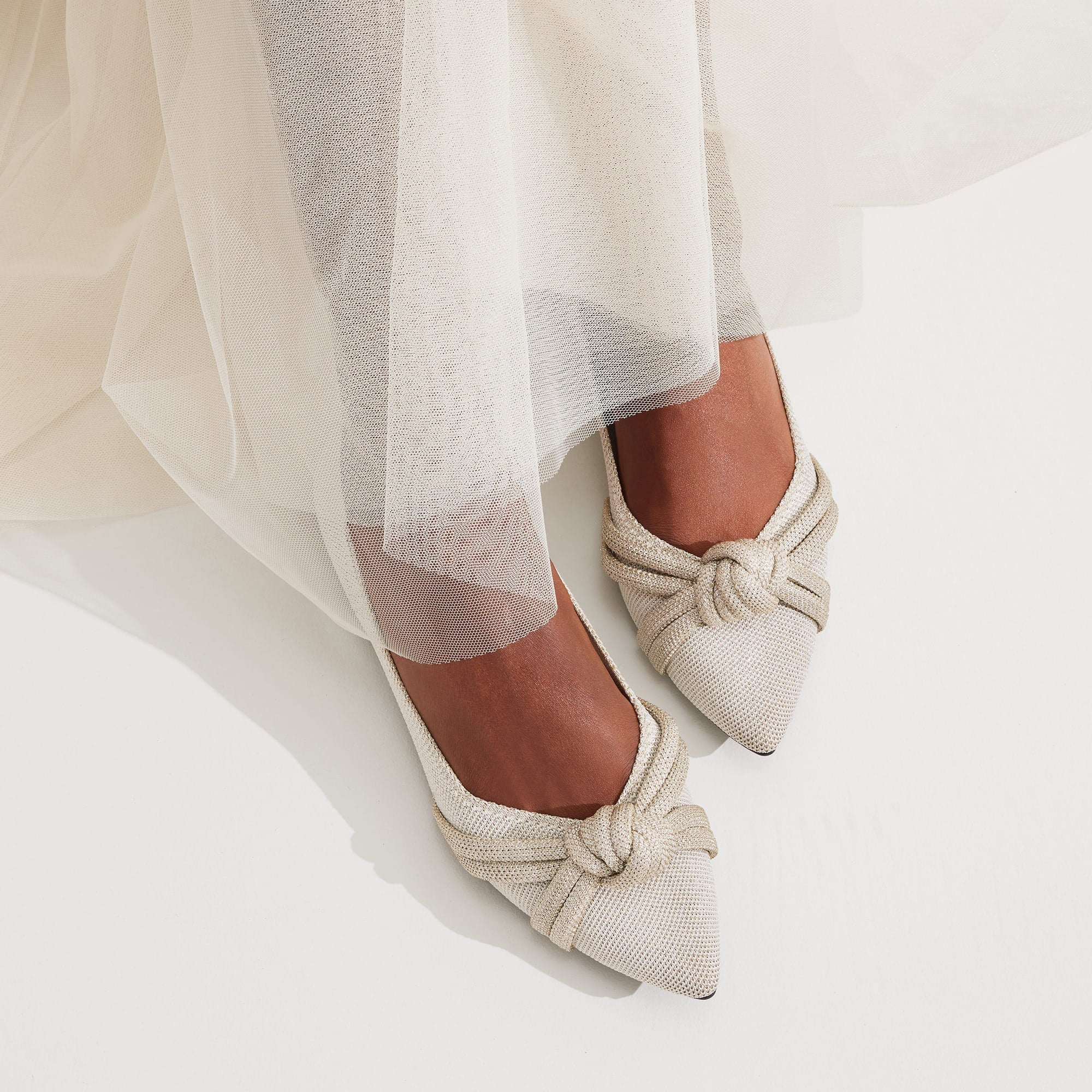 hover | Model wearing The Knot Point II in Diamond Metallic.