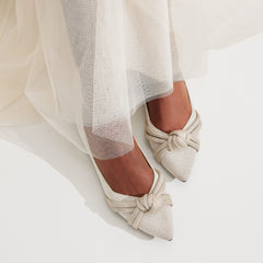 hover | Model wearing The Knot Point II in Diamond Metallic.