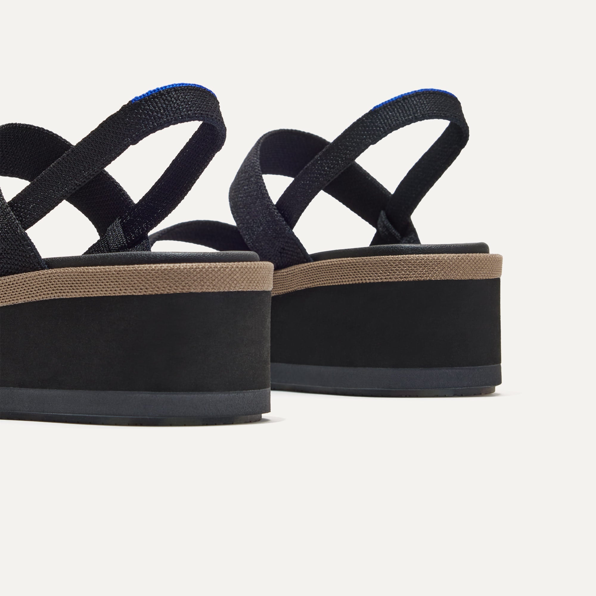 Close up of the heel of The Lightweight Wedge Sandal in Pepper.