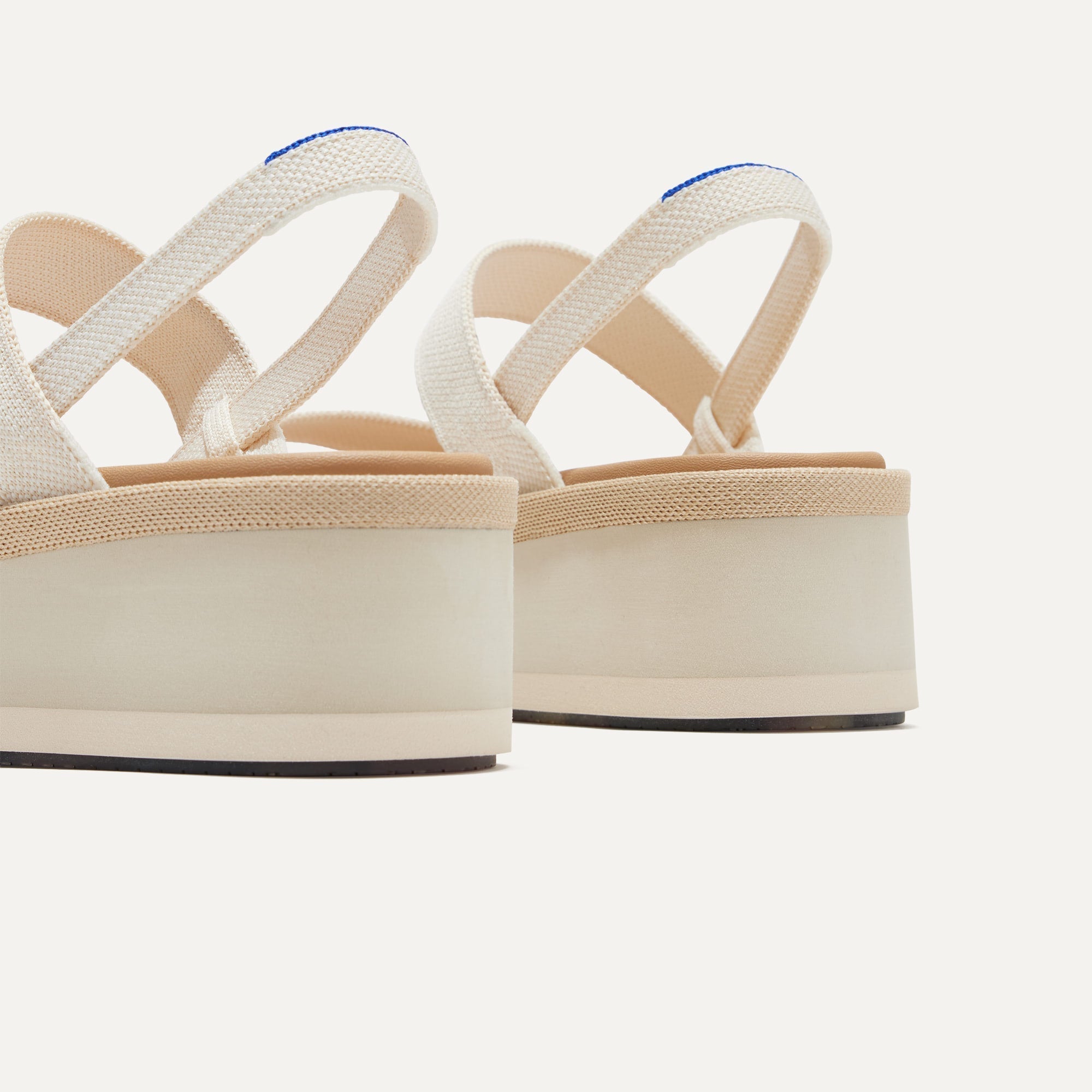 Close up of the heel of The Lightweight Wedge Sandal in Salt.
