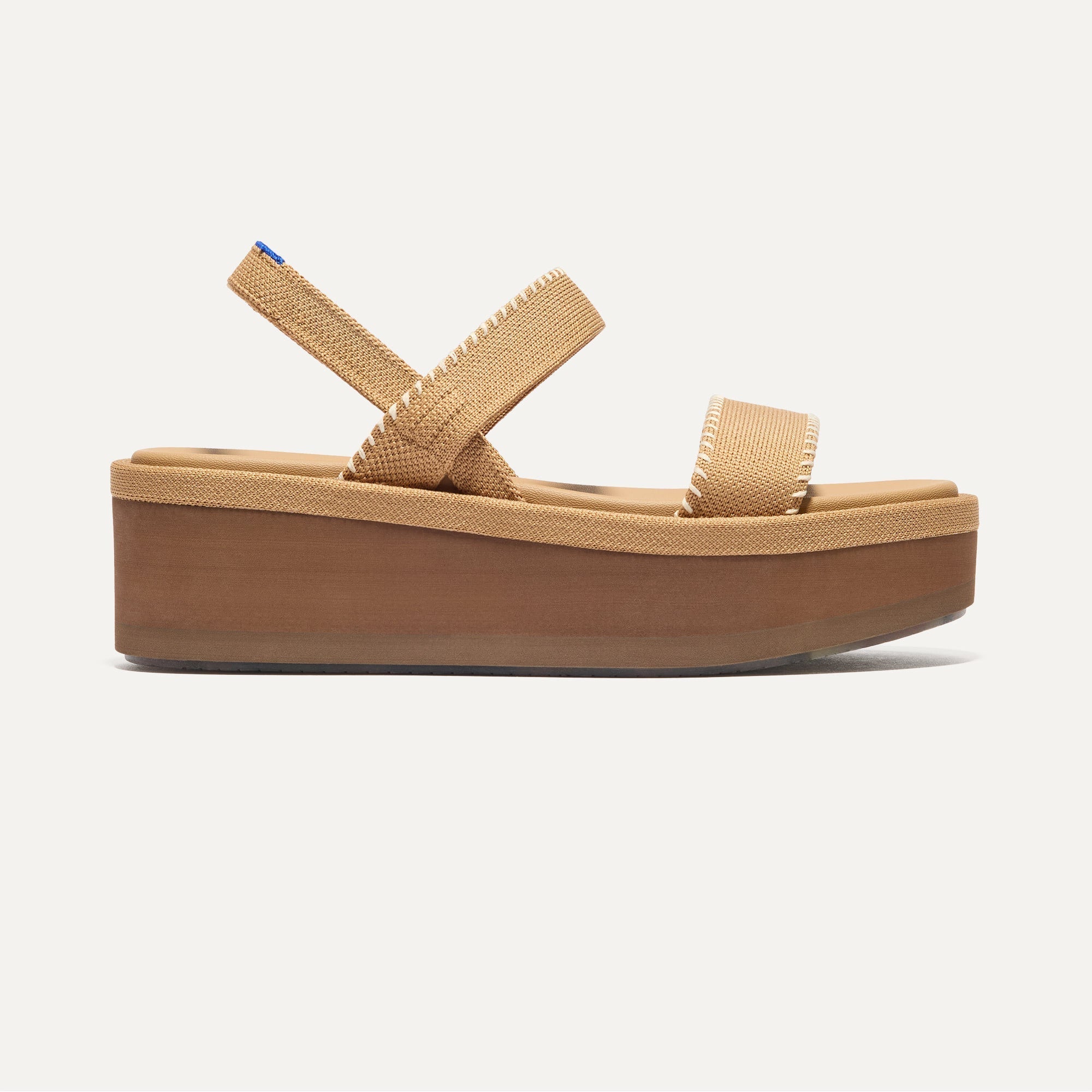 The Lightweight Wedge Sandal in Wren Whipstitch shown from the side.