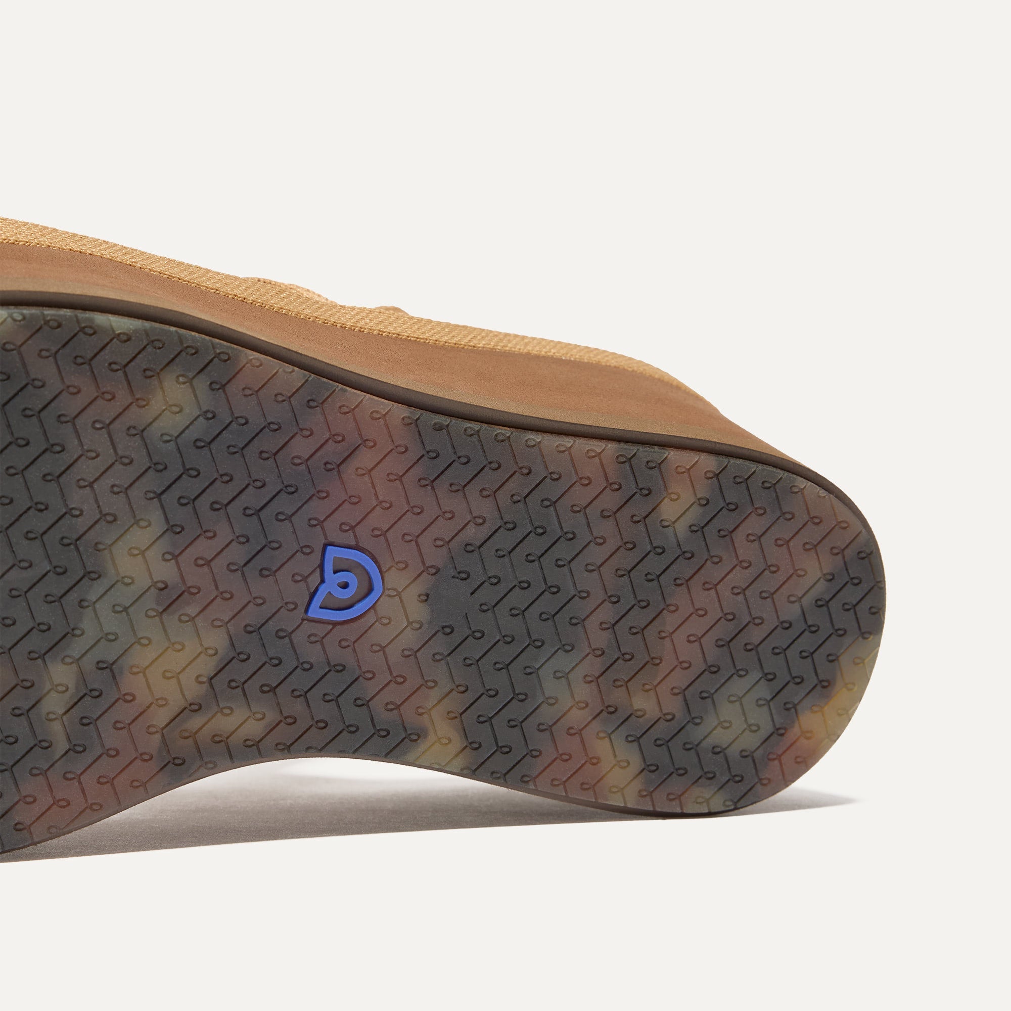 Close up of the outsole of The Lightweight Wedge Sandal in Wren Whipstitch.