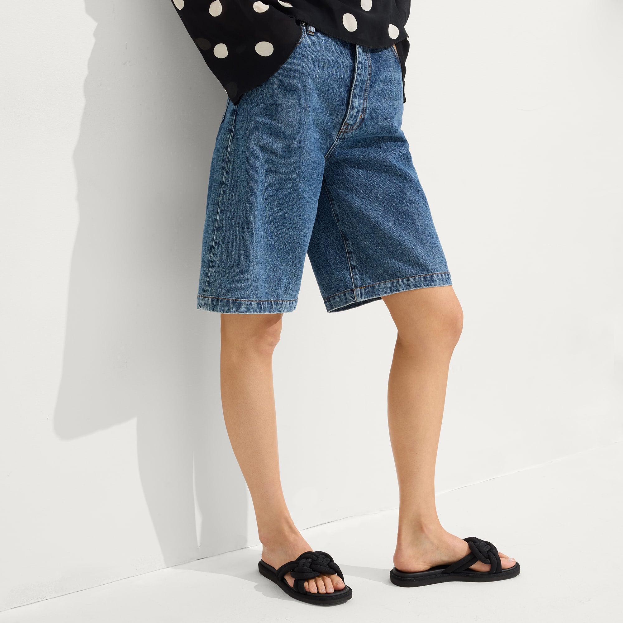 hover | Model wearing The Summer Sandal in Black.