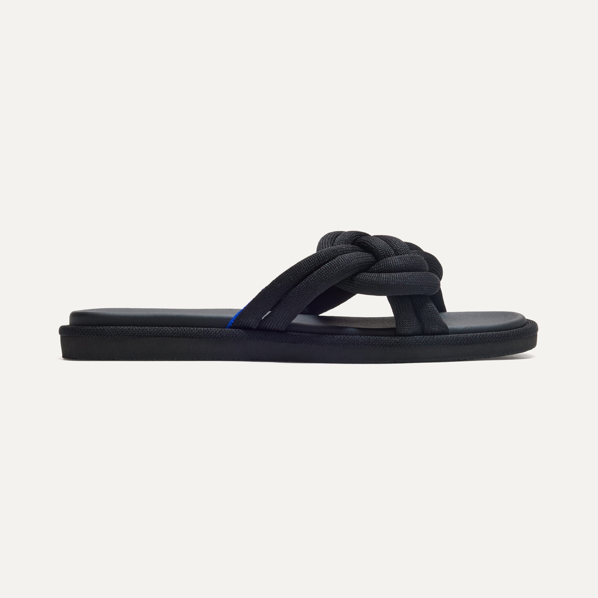 The Summer Sandal in Black shown from the side.