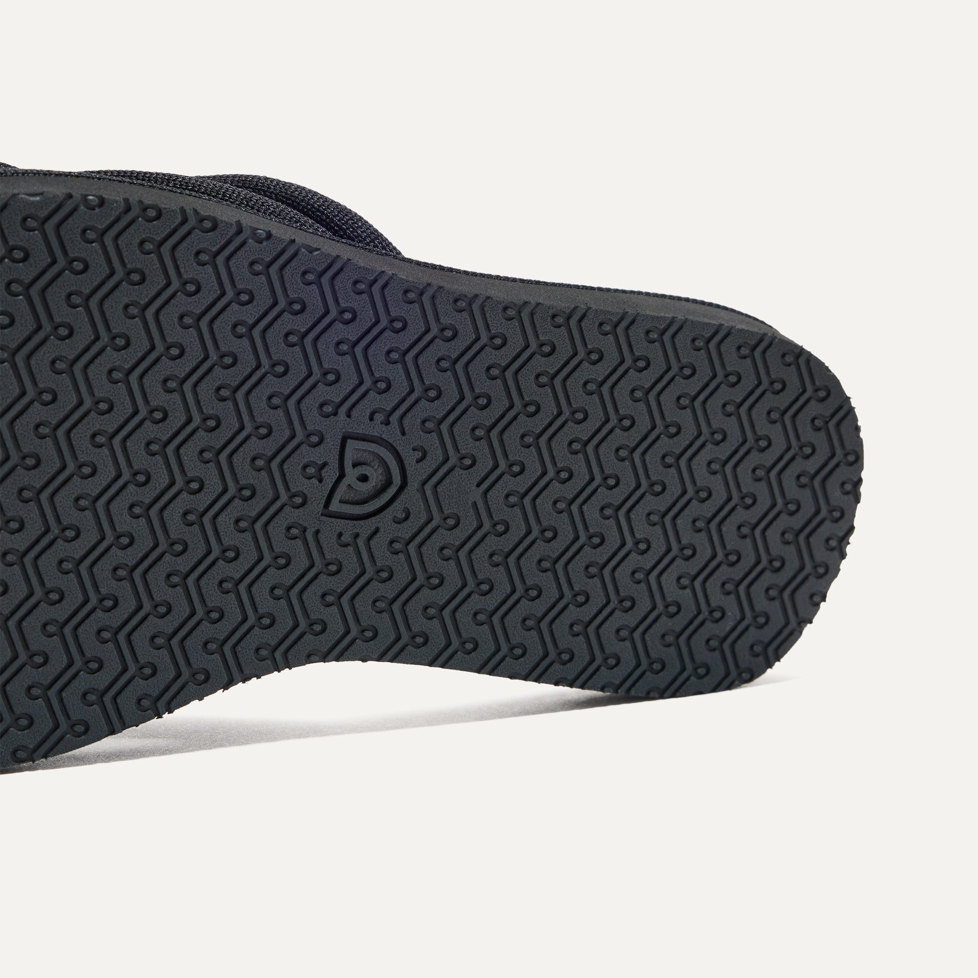 Close up of the outsole of The Summer Sandal in Black.