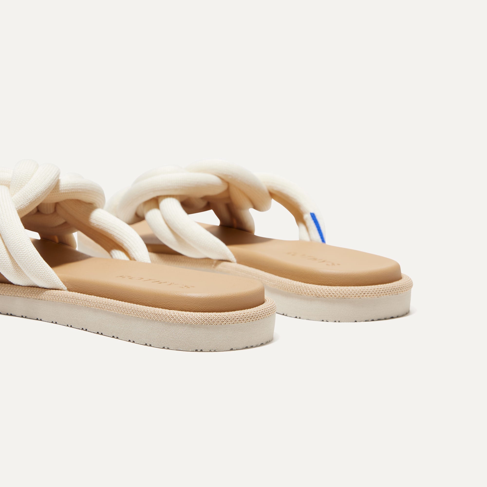 Close up of the heel of The Summer Sandal in White Sand.