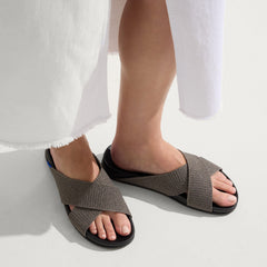 hover | Model wearing The Weekend Slide in Silver Sand.