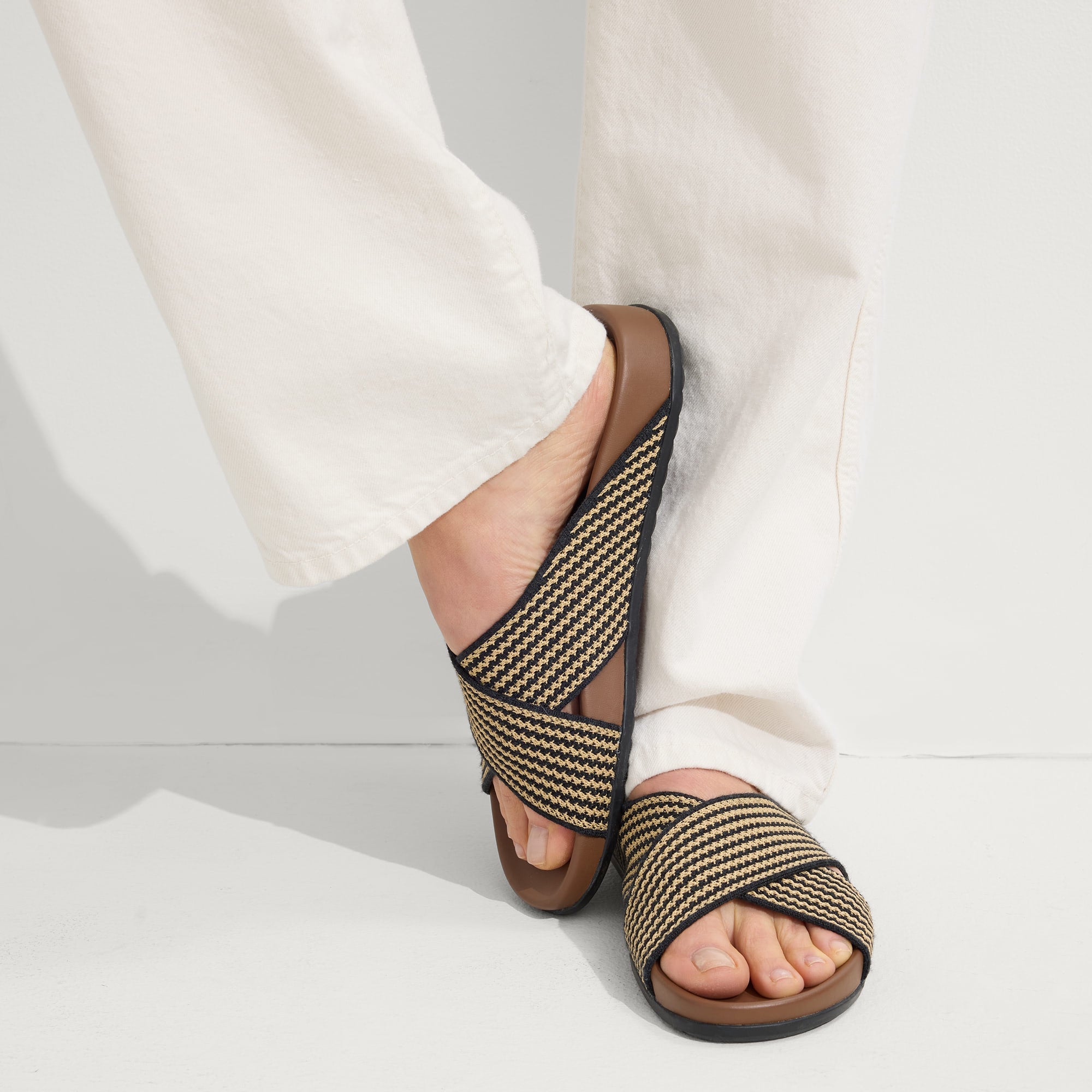 hover | Model wearing The Weekend Slide in Toffee Stripe.
