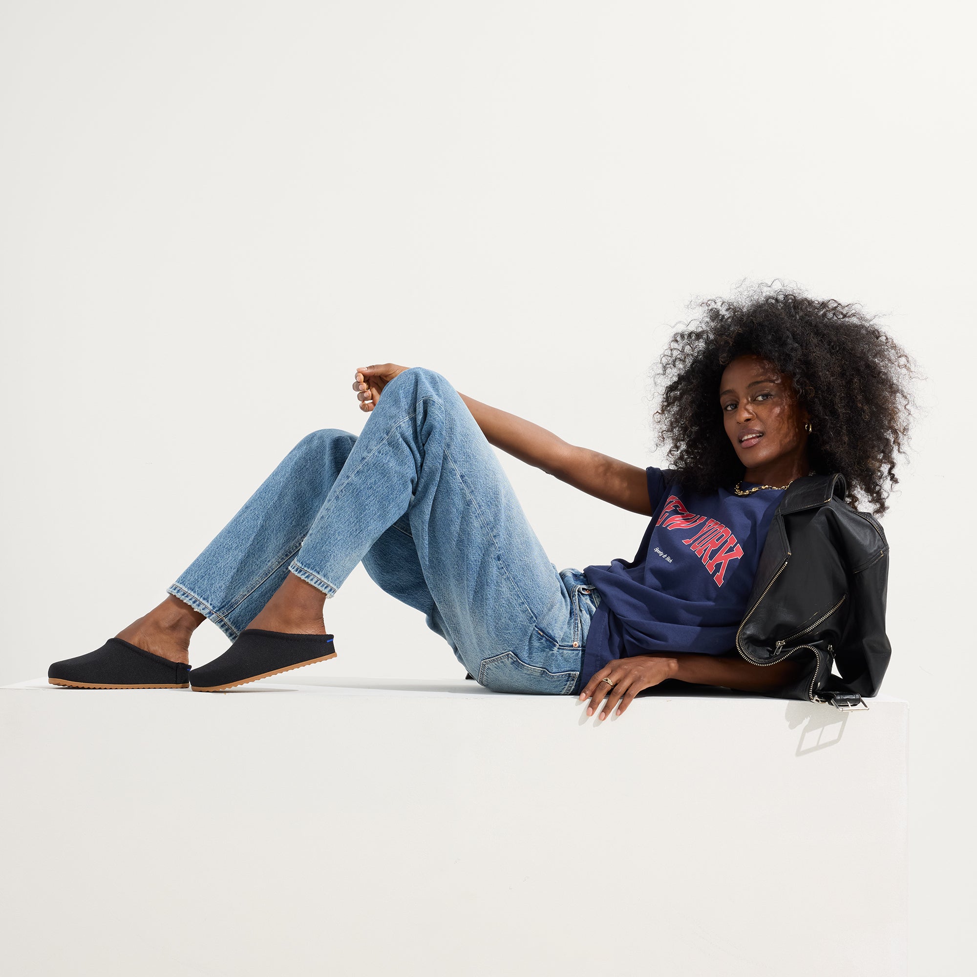 Alternate view of a model wearing The Casual Clog in Black.