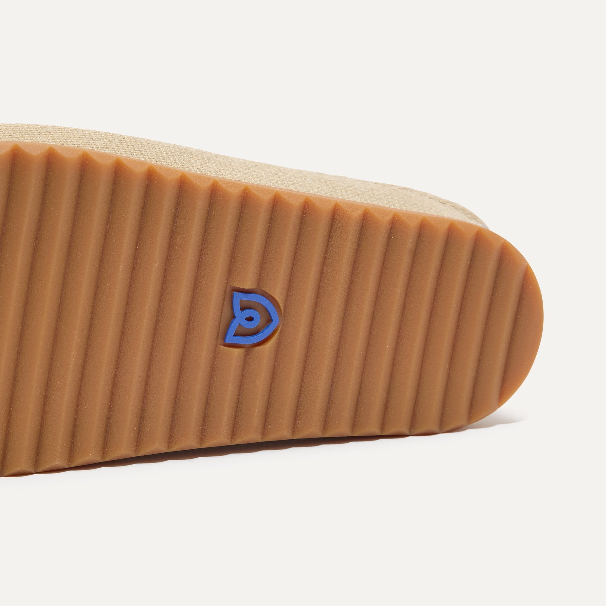 Close up of the outsoles of The Casual Clog in Dune.