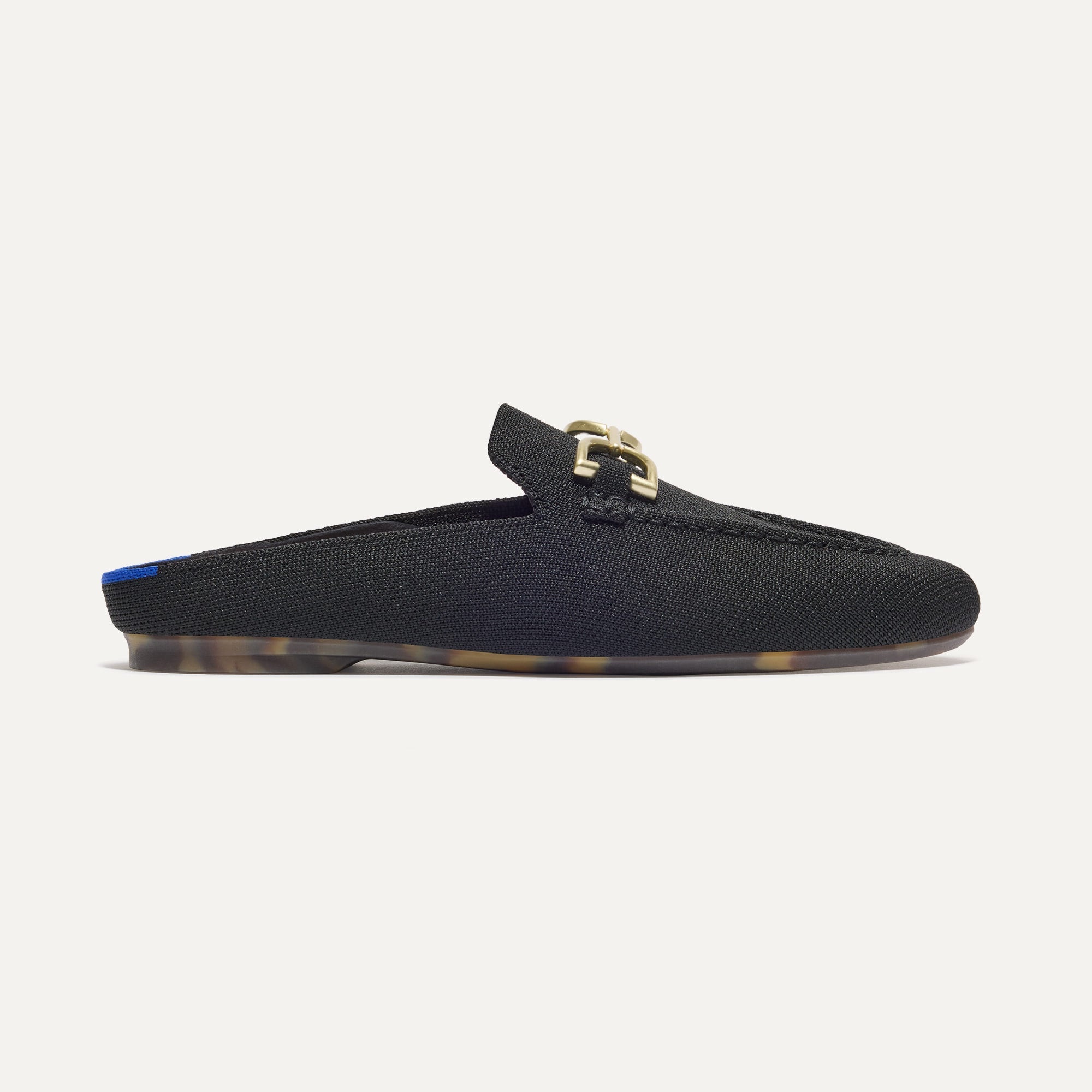The Double Bit Loafer Mule in Black shown from the side.