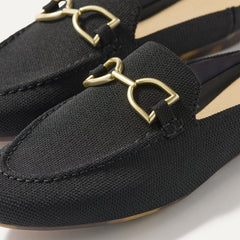 Close up of the toe and hardware of The Double Bit Loafer Mule in Black.