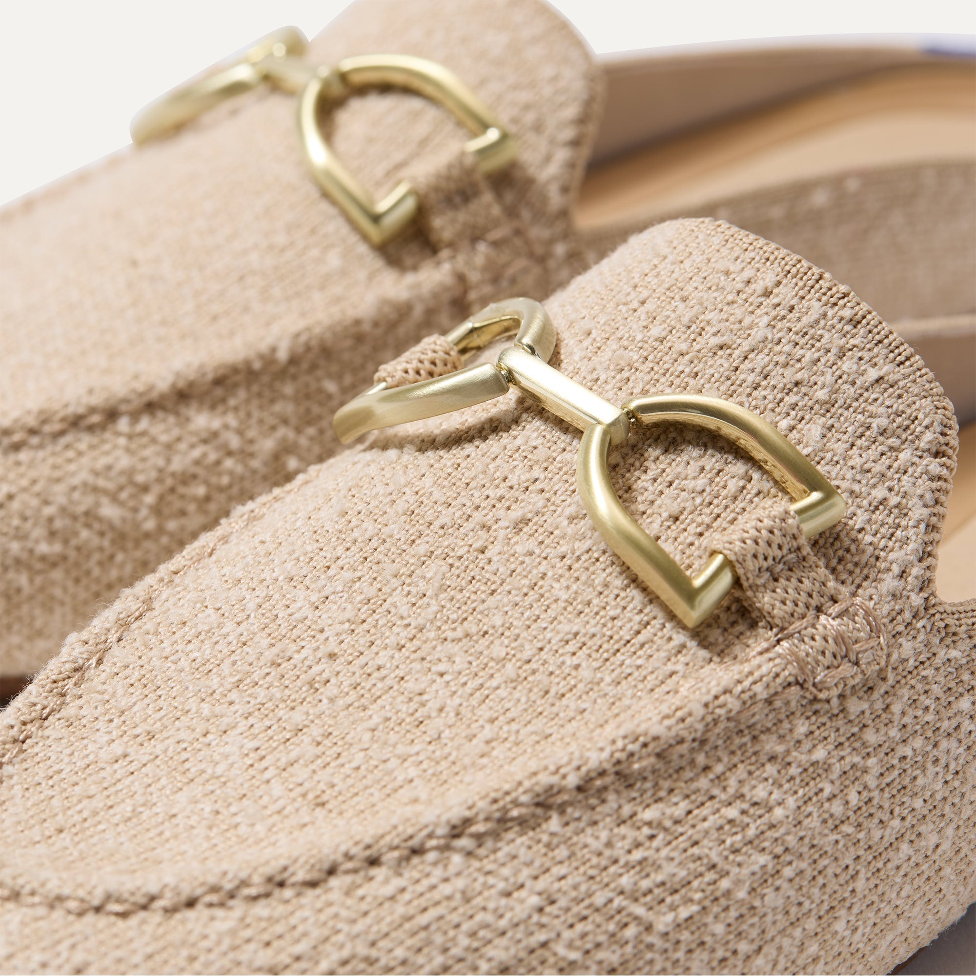 Close up of the toe and hardware of The Double Bit Loafer Mule in Bunny Bouclé.