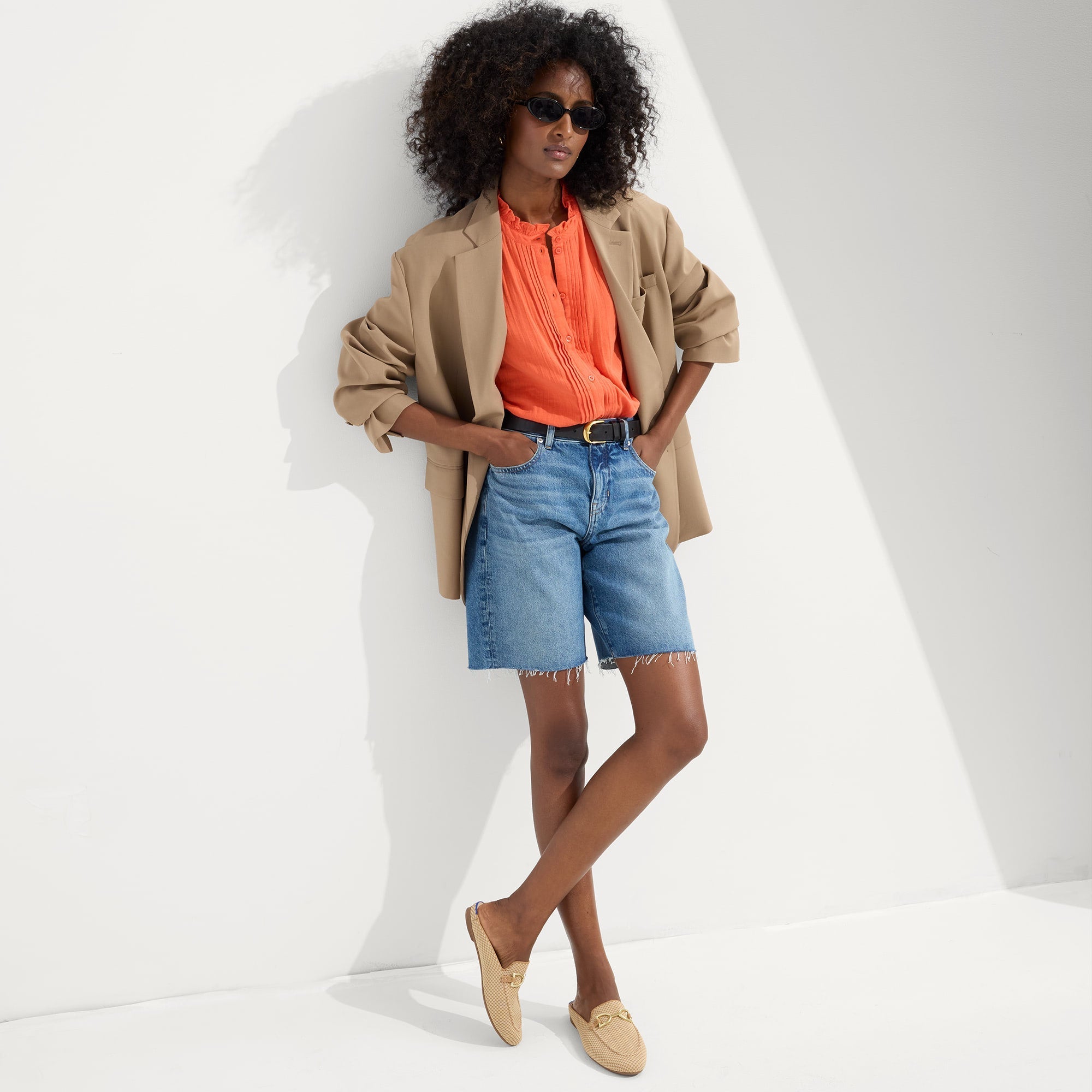 Alternate view of a model wearing The Double Bit Loafer Mule in Waffle Micro Check.