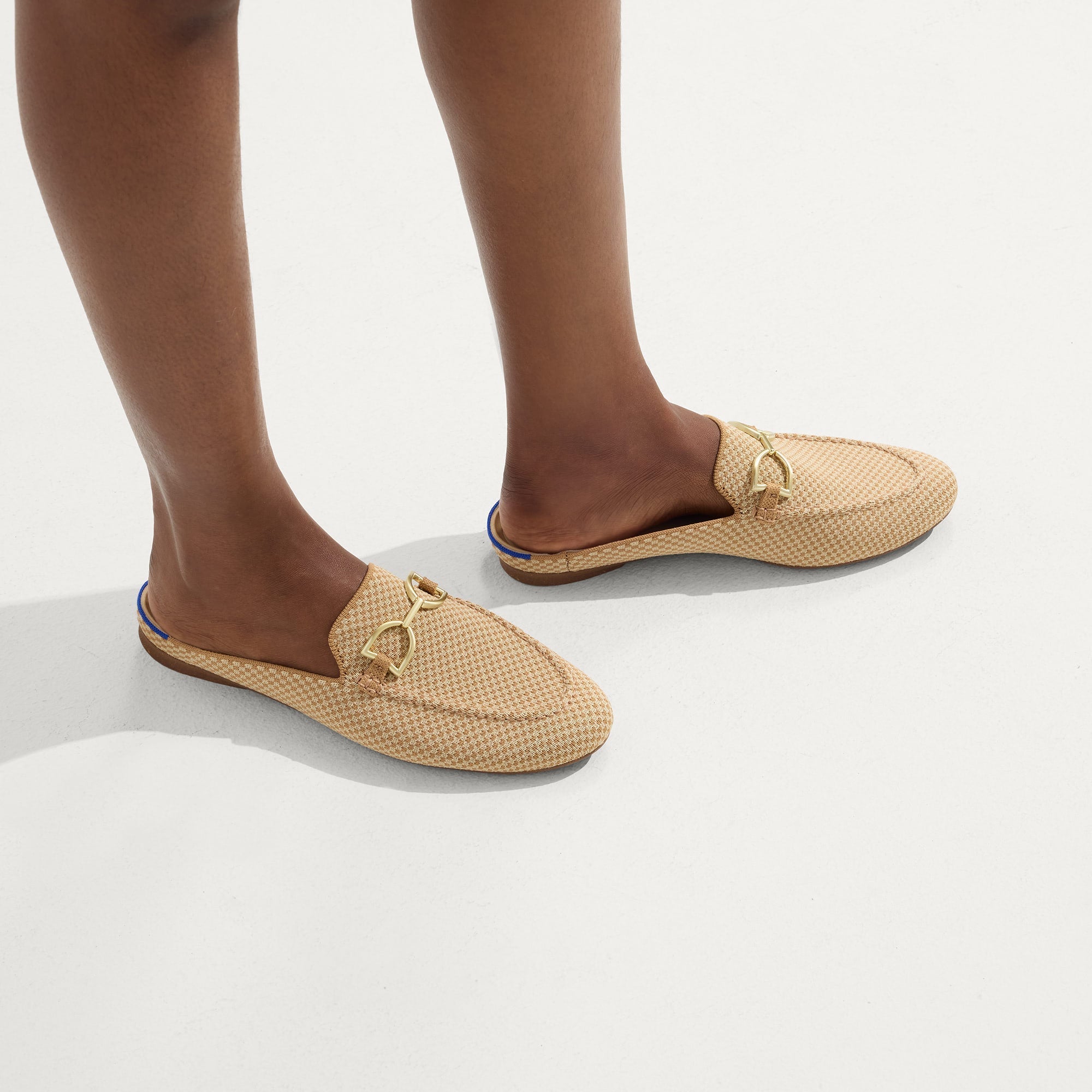 hover | Model wearing The Double Bit Loafer Mule in Waffle Micro Check.