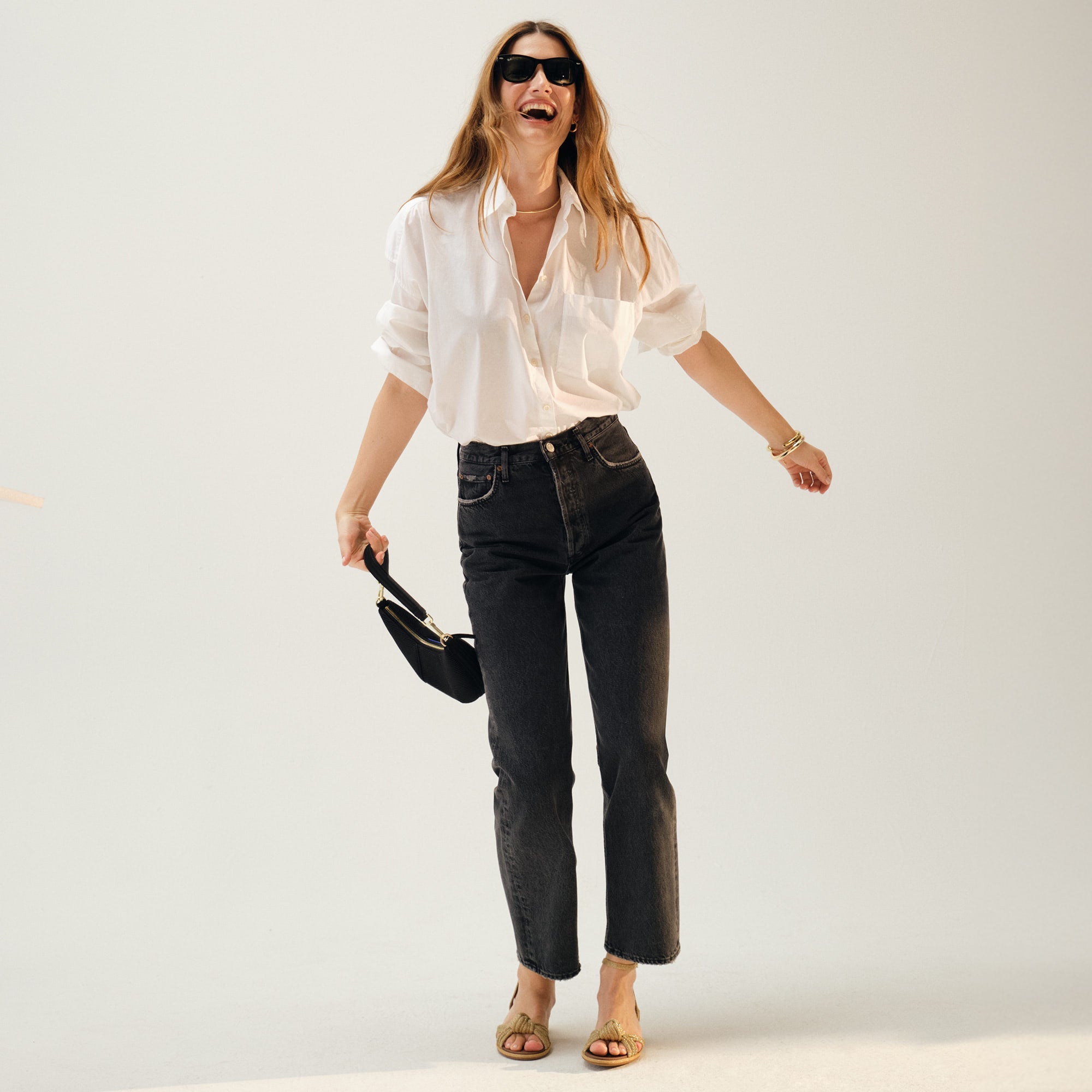 Alternate view of a model wearing The Knot Sandal in Golden Sun.