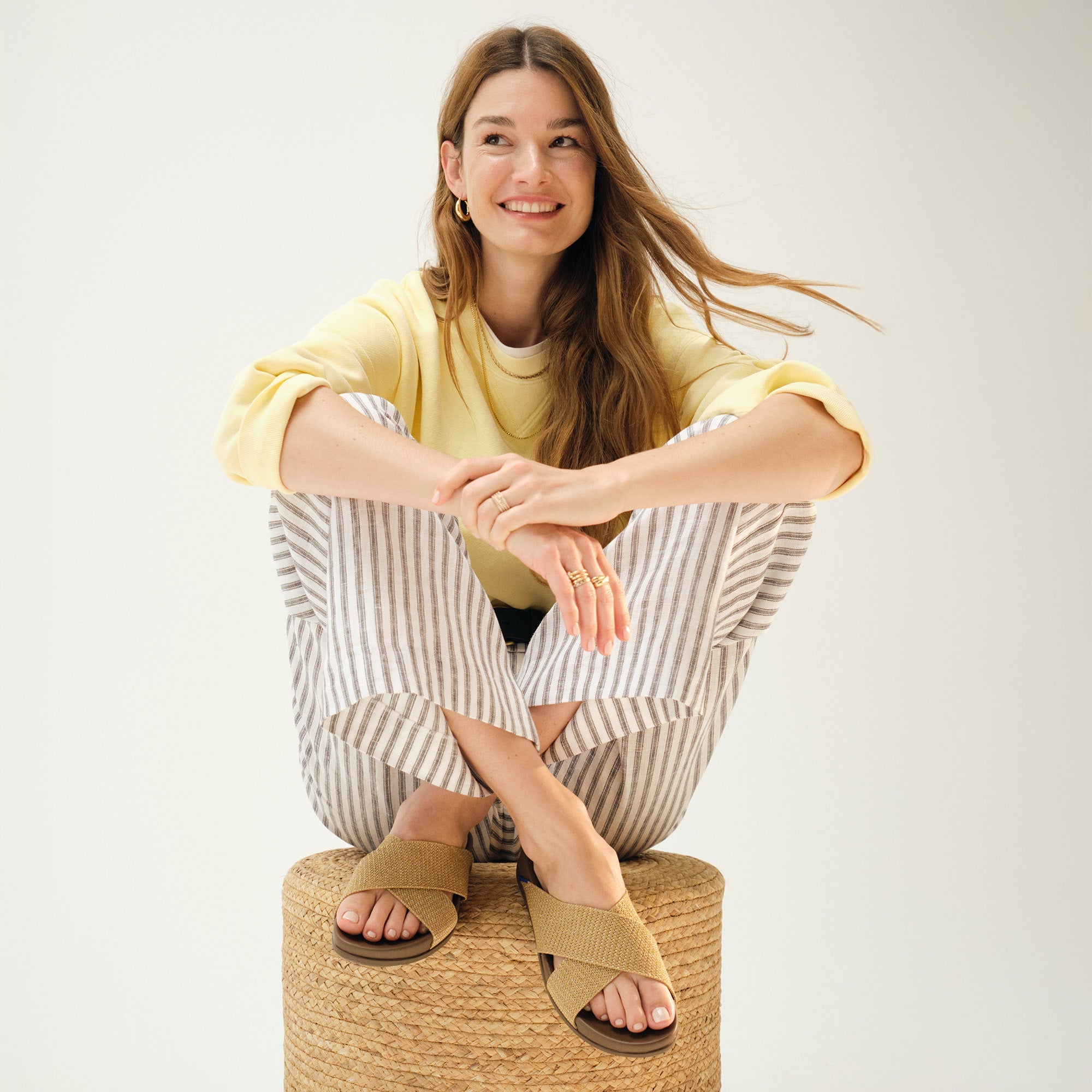 Alternate view of a model wearing The Weekend Slide in Golden Sun.