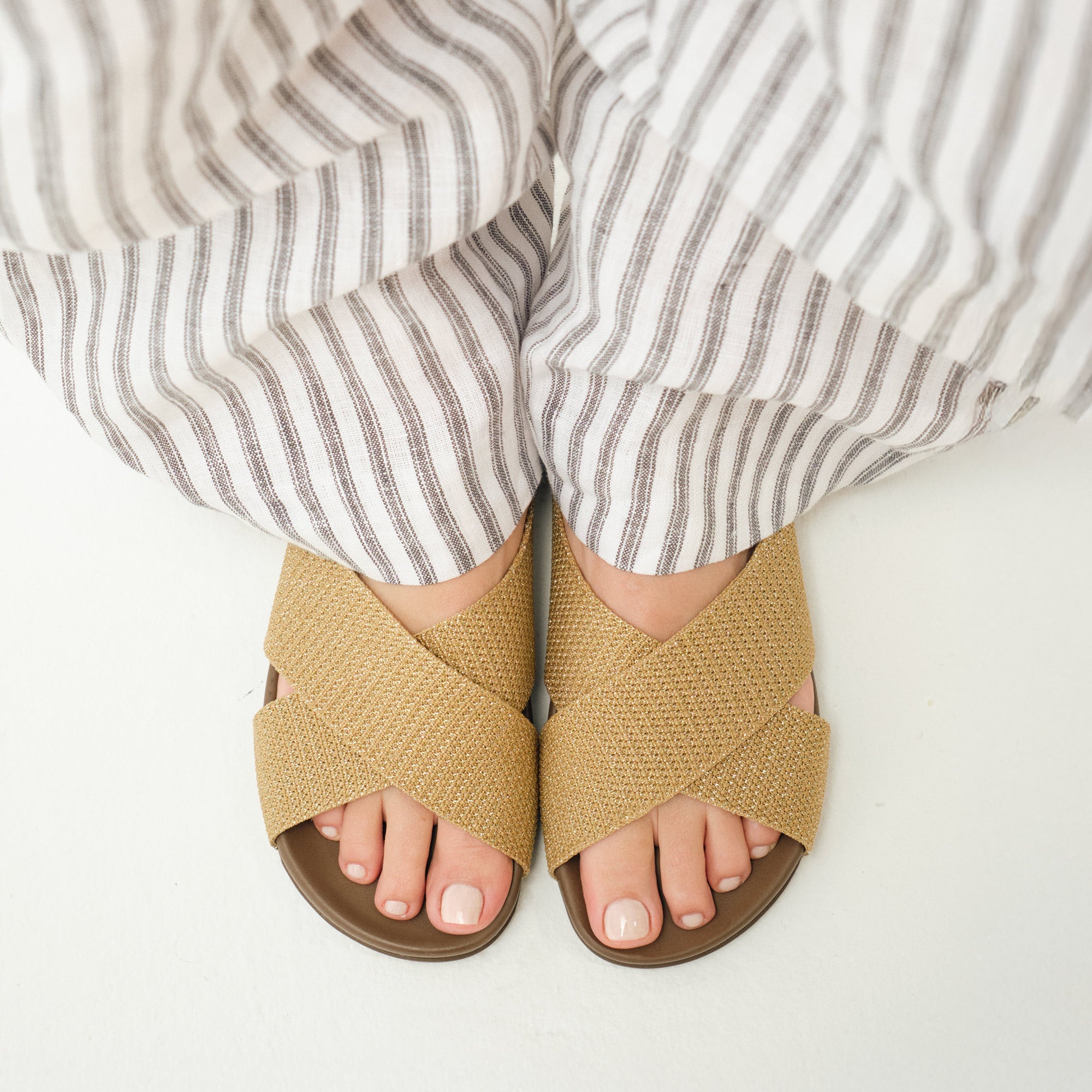 hover | Model wearing The Weekend Slide in Golden Sun.