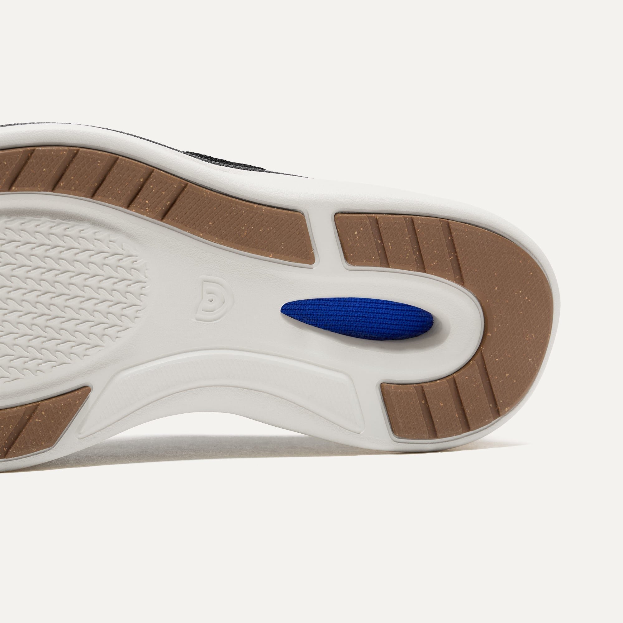 Outsole of The Oxford in Black shown from below, in diagonal view. 