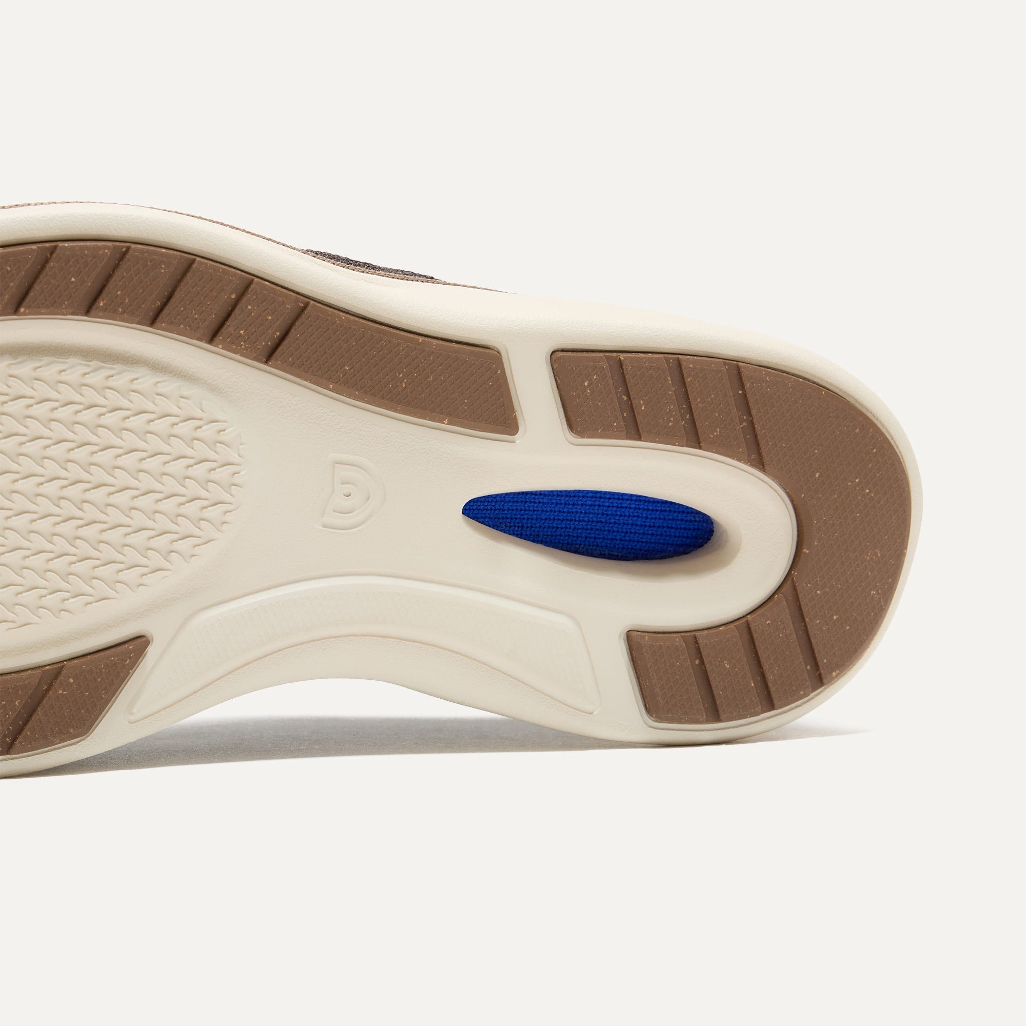 Outsole of The Oxford in Deep Brown shown from below, in diagonal view. 