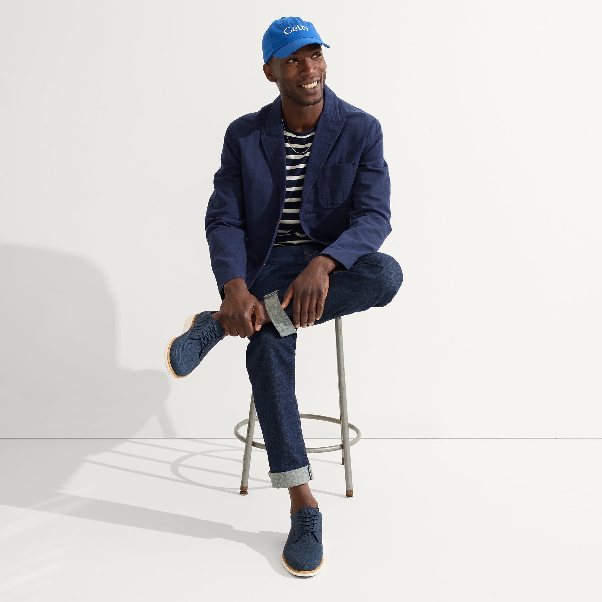 Alternate view of a model wearing The Oxford in Night Navy.