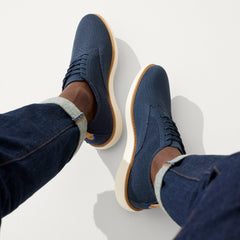 hover | Model wearing The Oxford in Night Navy.