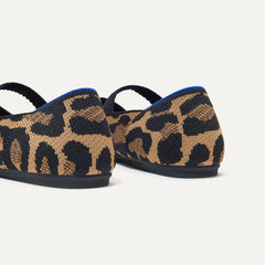 Close up of the heel of The Kids Mary Jane in Amber Cat, with shimmery gold pull tab.