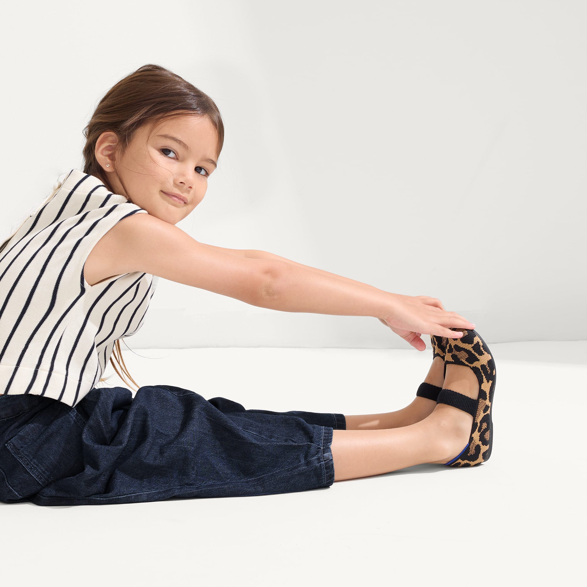 Alternate view of a model wearing The Kids Mary Jane in Amber Cat.