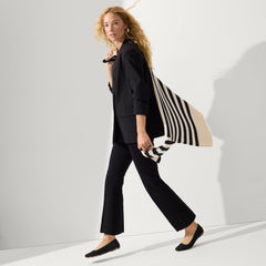 Alternative angle of model wearing The Max Square in Black.