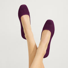hover | Model wearing The Max Square in Plum Mesh.