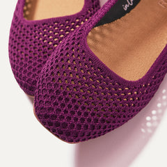 Close up of The Max Square in Plum Mesh, shown in diagonal view.