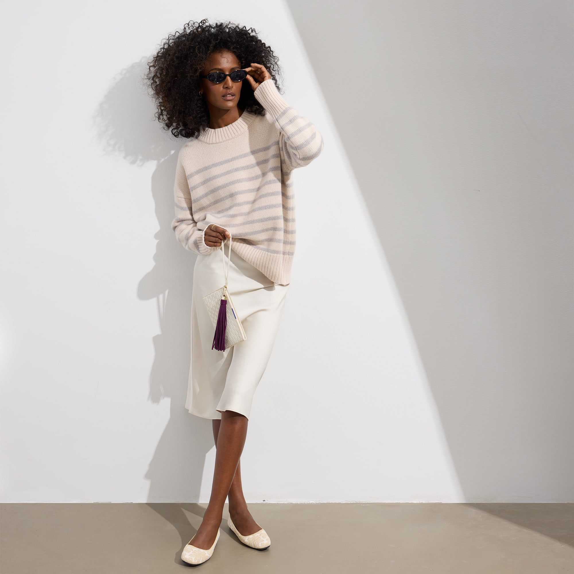 Alternative angle of model wearing The Max Square in White Chantilly.