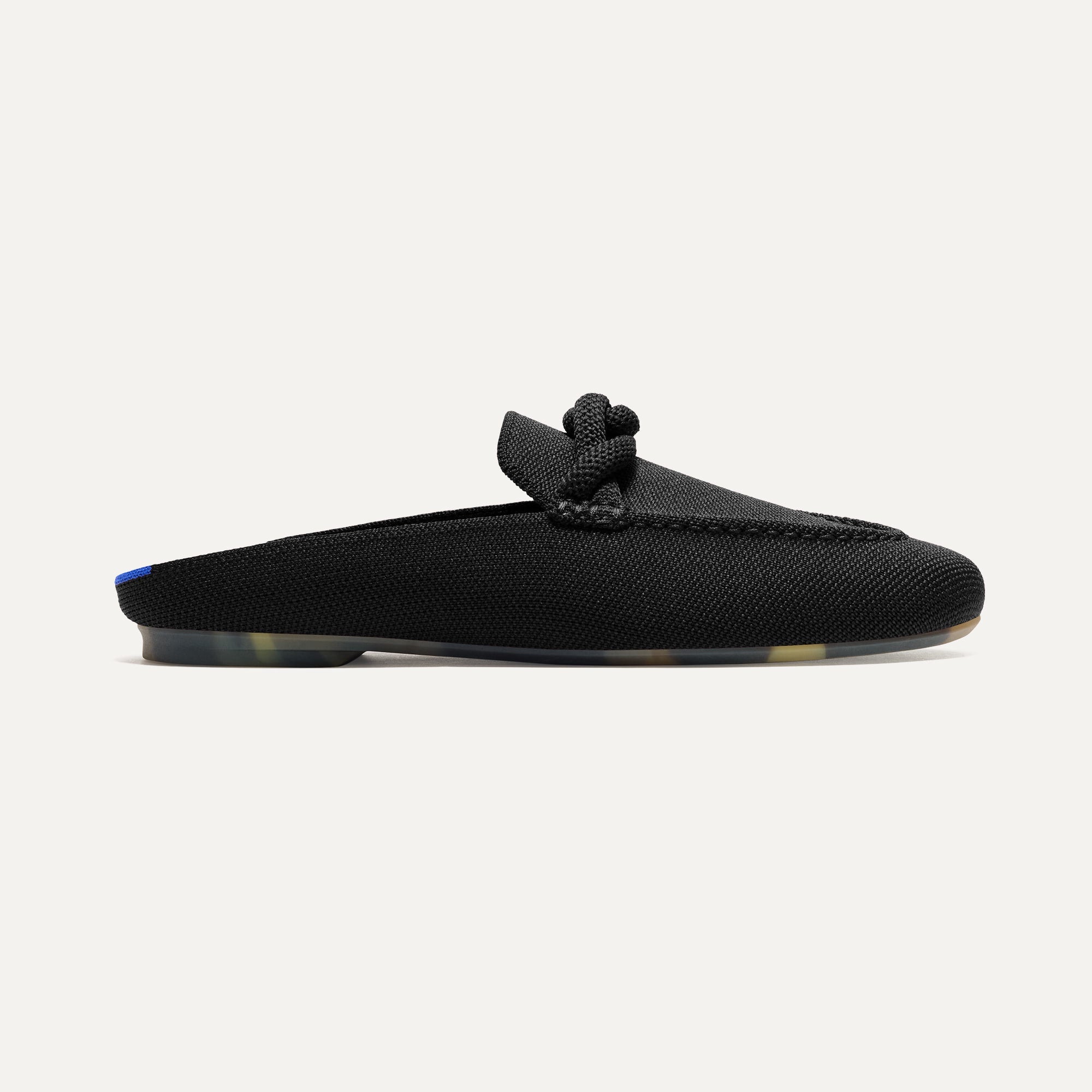 The Loafer Mule in Black shown from the side.
