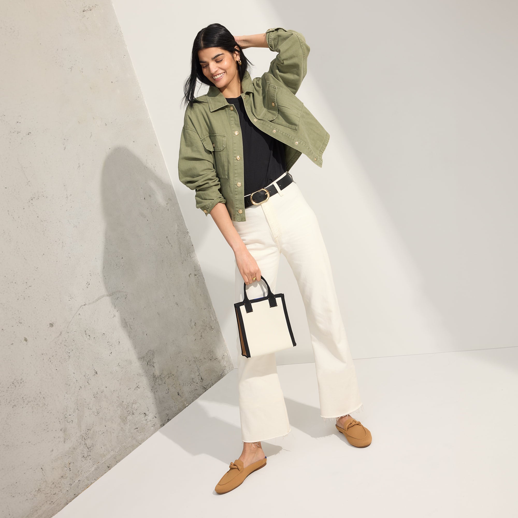 Alternate view of a model wearing The Loafer Mule in Wren Birdseye.