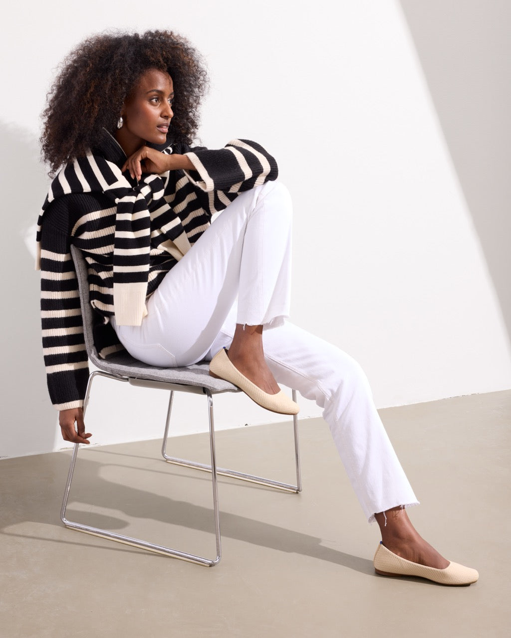 Alternative angle of model wearing The Max Square in Sandstone Micro Check.