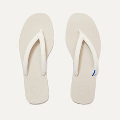 A pair of The Flip Flops in White Sand shown from the top view.
