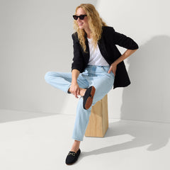 Alternate view of a model wearing The Double Bit Driver in Black.