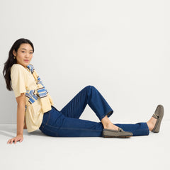 Alternate view of a model wearing The Double Bit Driver in Classic Micro Check.