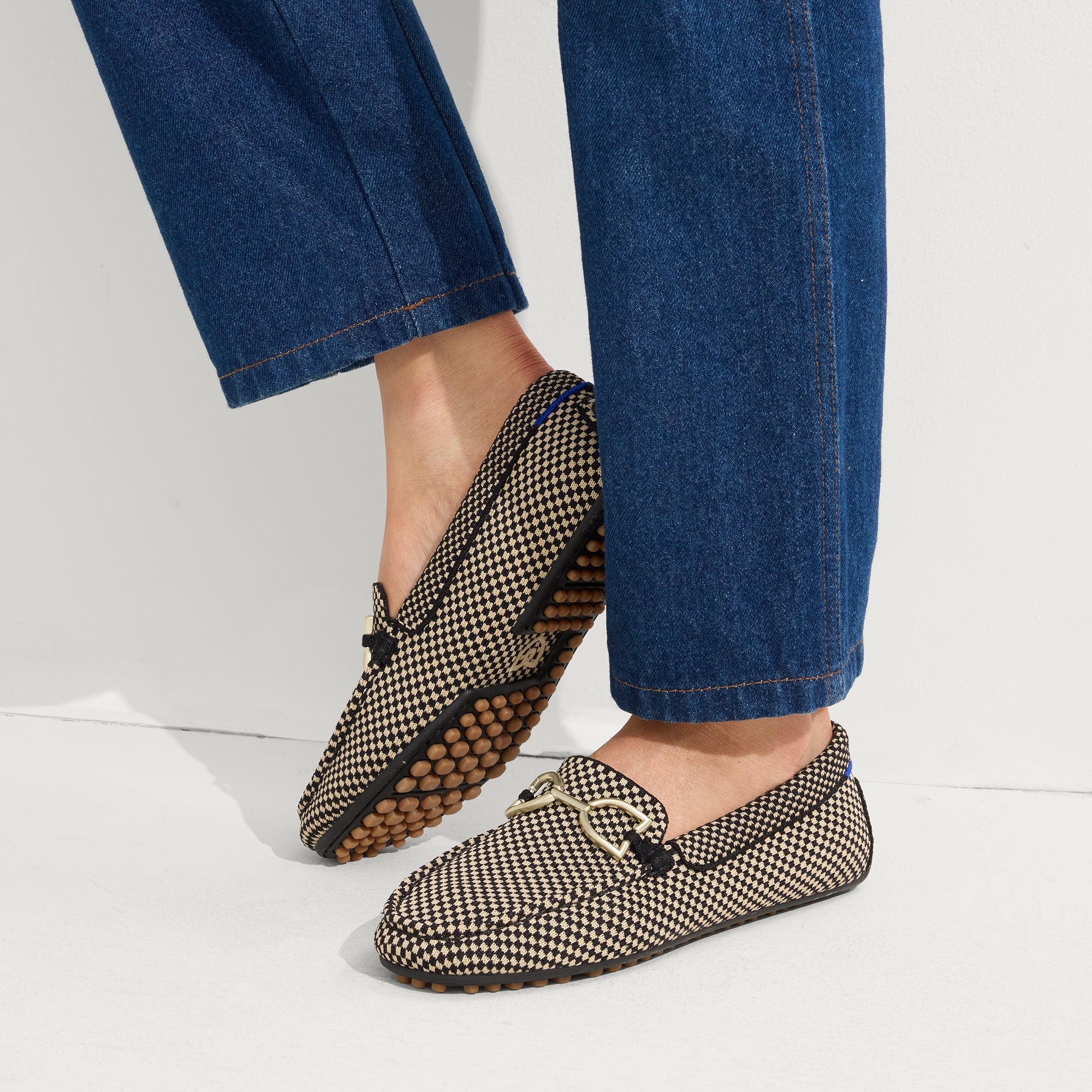 hover | Model wearing The Double Bit Driver in Classic Micro Check.