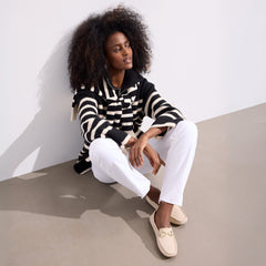 Alternate view of a model wearing The Double Bit Driver in Sesame.