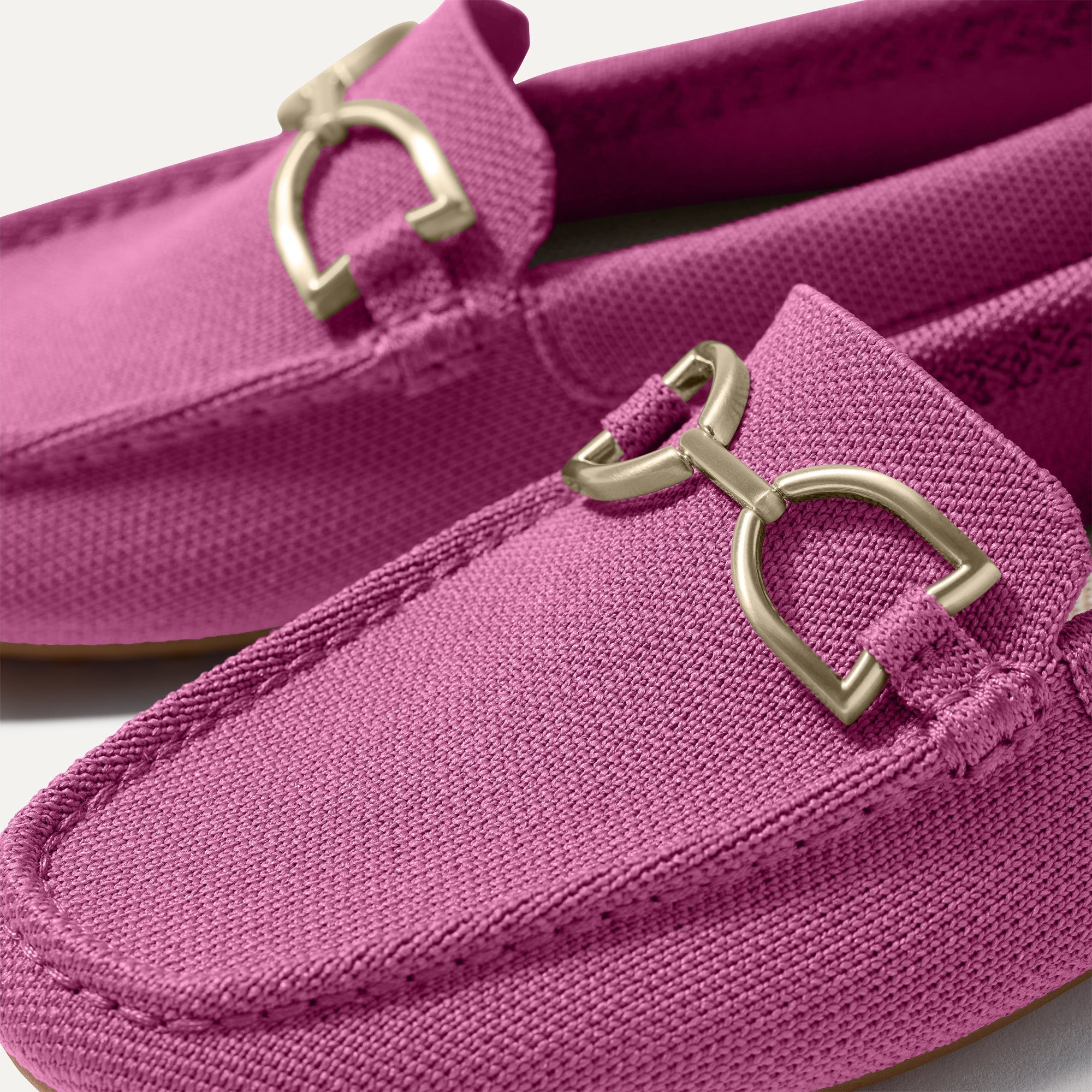 Close up of the toe and hardware of The Double Bit Driver in Taffy Pink.