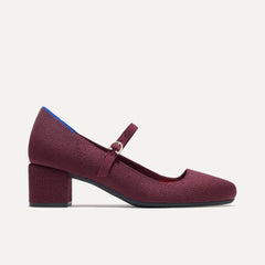The Mary Jane Heel in Wine Red shown from the side.