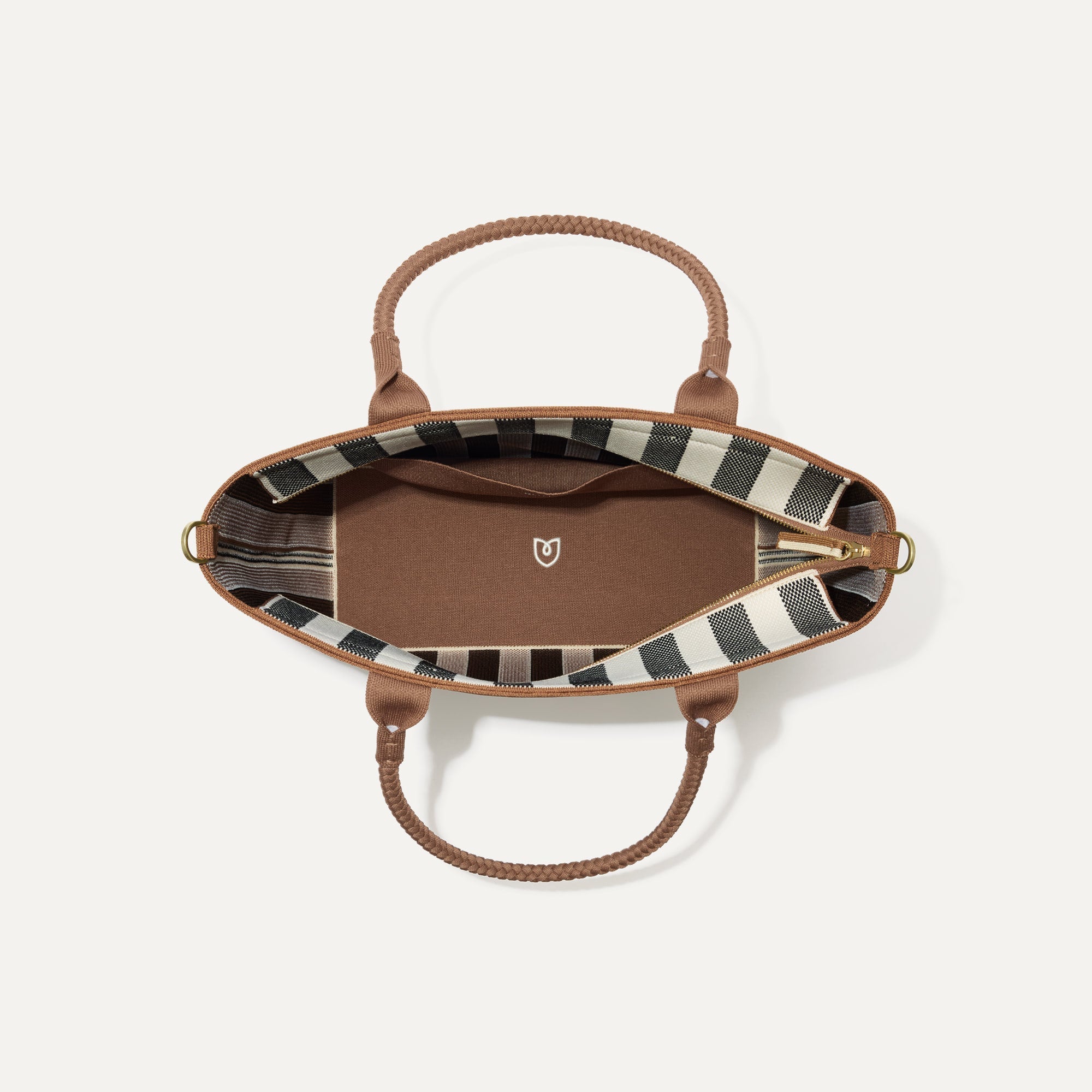 The Lightweight Zip Tote, shown from above with the interior exposed.
