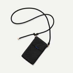The Phone Crossbody in Black Sand shown from above.